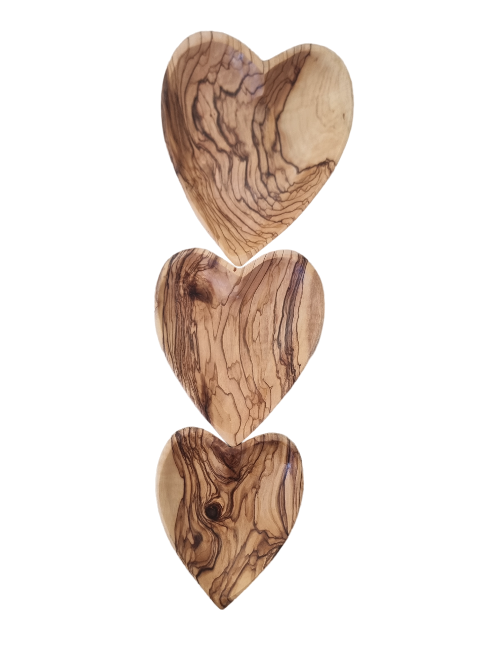 Three Heart Shaped Bethlehem Olive Wood Bowls Displayed Vertically .