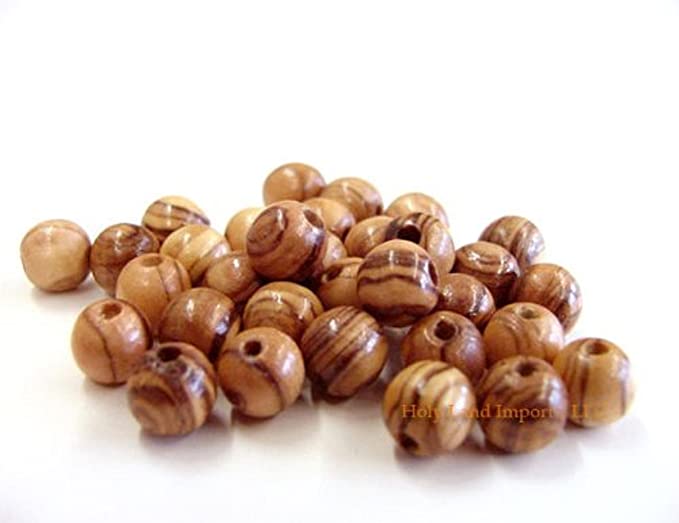 Small Handful Of 6mm Bethlehem Round Olive Wood Beads.